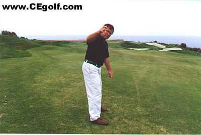 image of improper position of right elbow at top of backswing
